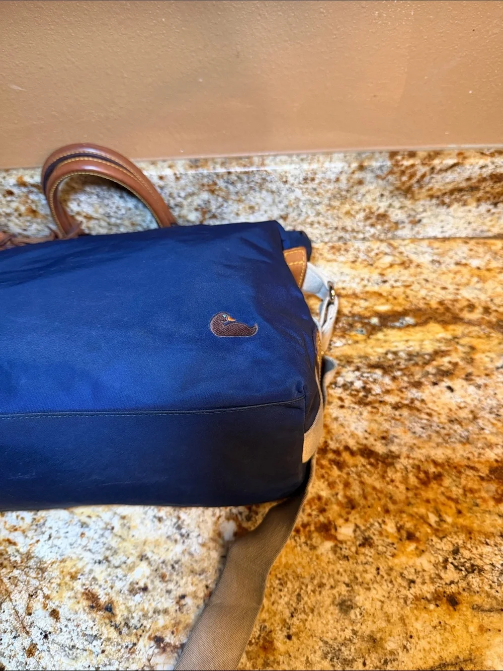 Dooney & Bourke Navy Nylon Messenger Bag with Tan Leather Trim